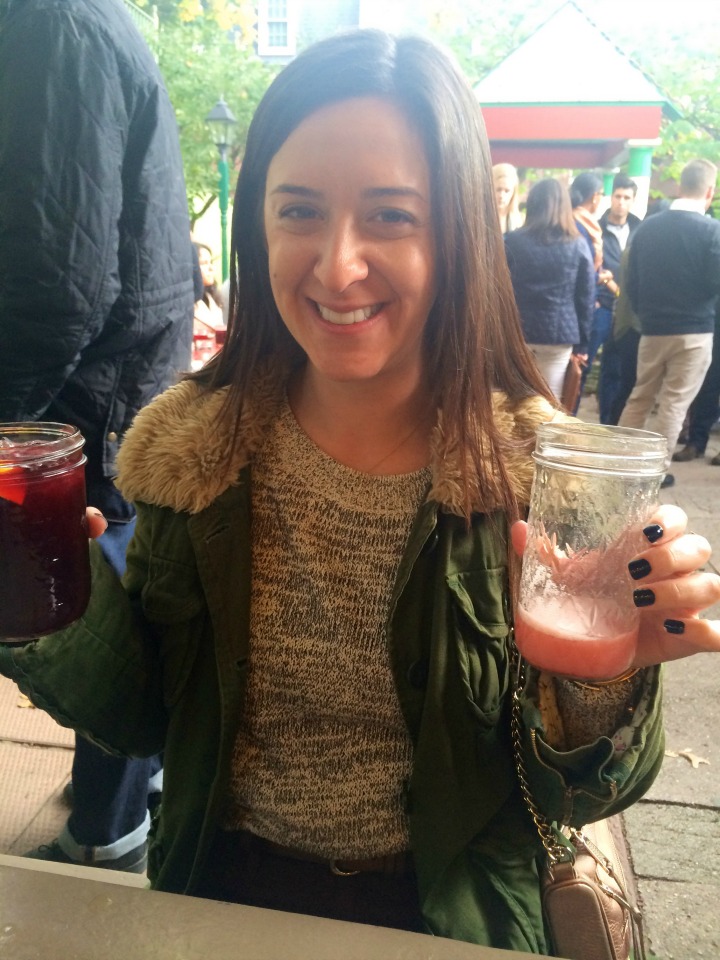 Rory holding up drinks at Dominick's